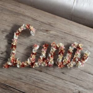 Grand mot en fleurs séchées de plus de 10 lettres