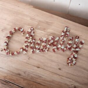 Petit mot en fleurs séchées de + de 10 lettres